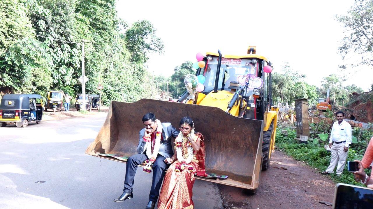 Bride and Groom make an epic procession on a JCB post wedding in Karnataka