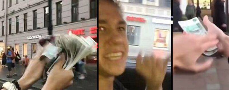 a richman thrown money in a street in russia