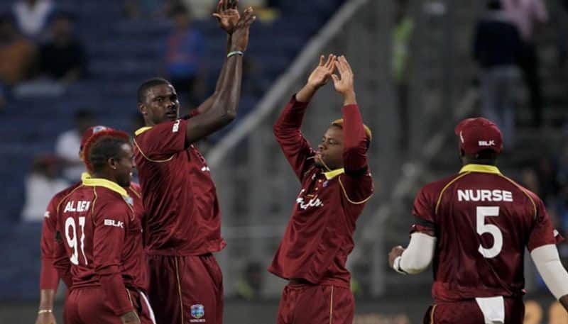 hetmyer century leads west indies to beat england in second odi