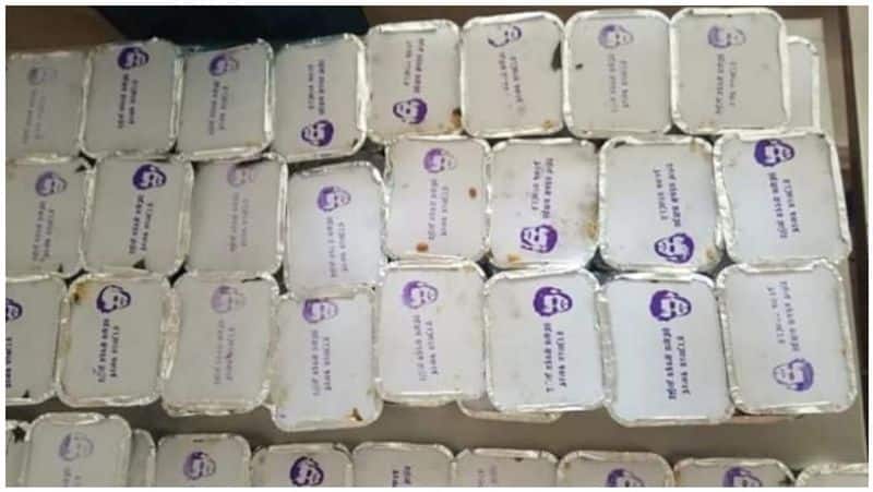 rajini fans pasting sticker on relief foods