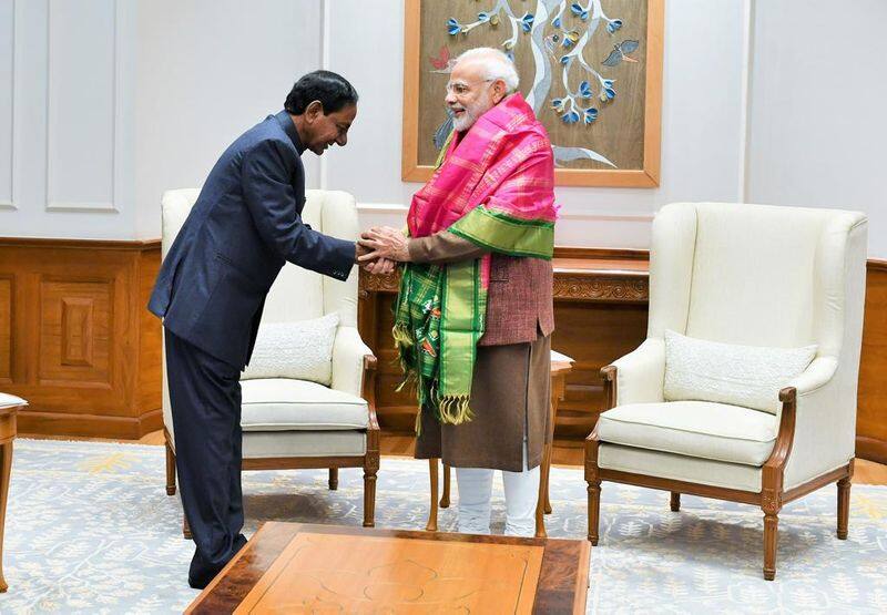 cm kcr meets pm modi due to  pending projects