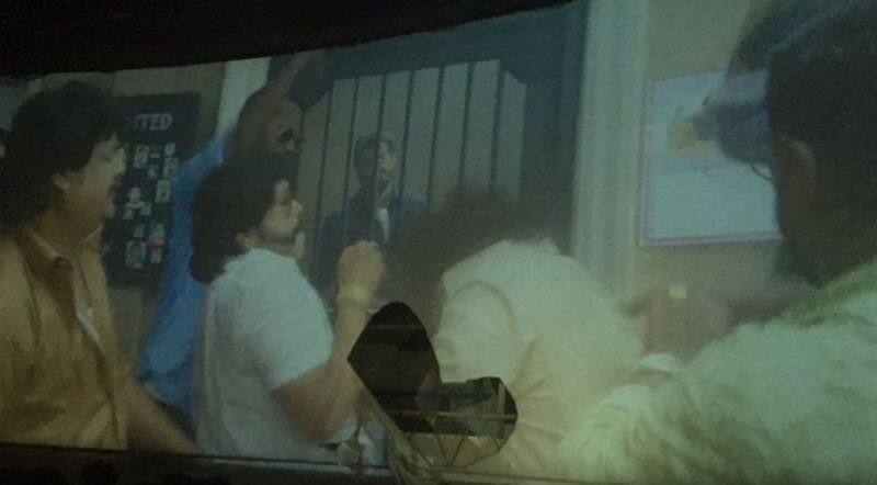 ajith fans tear the cinema theater 70mm screen