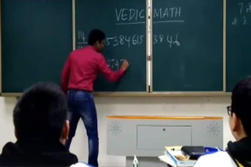tamil teacher rocks in china by taking maths class