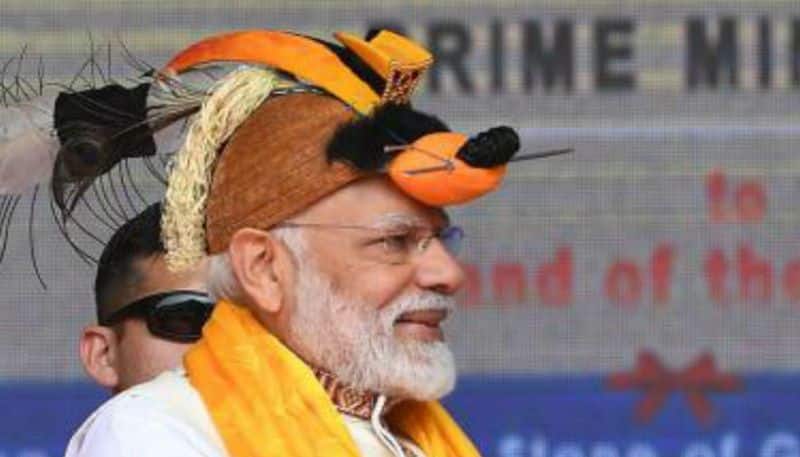 narendra modi wears arunachal pradesh tribal hat