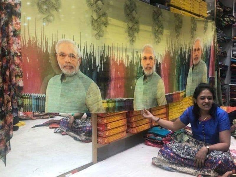 Modi jackets Modi-fied saris hit Gujrat markets