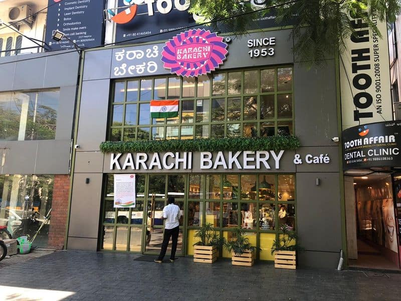 Karachi Bakery signboard back; hoarding put up for clarification