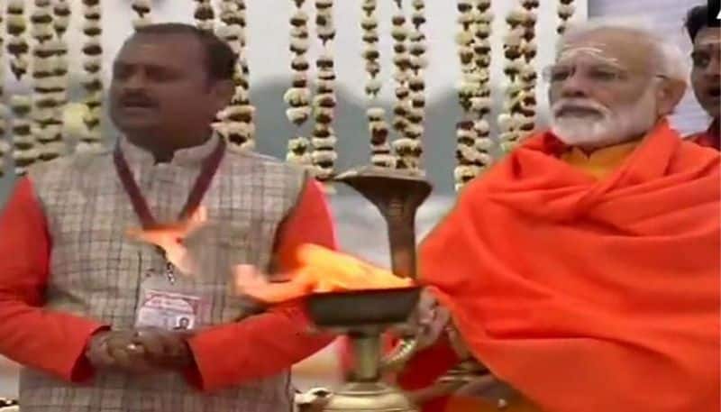PM Modi takes holy dip at the Triveni Sangam, honours sanitation workers