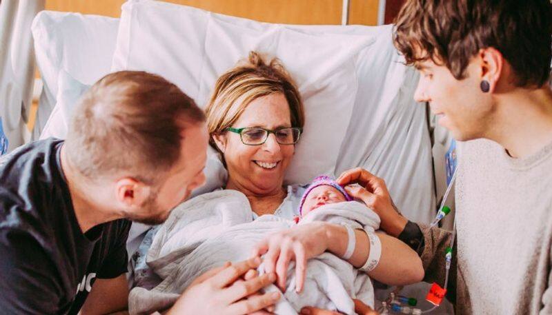 woman 61 gives birth to her own grand daughter as her gay sons surrogate