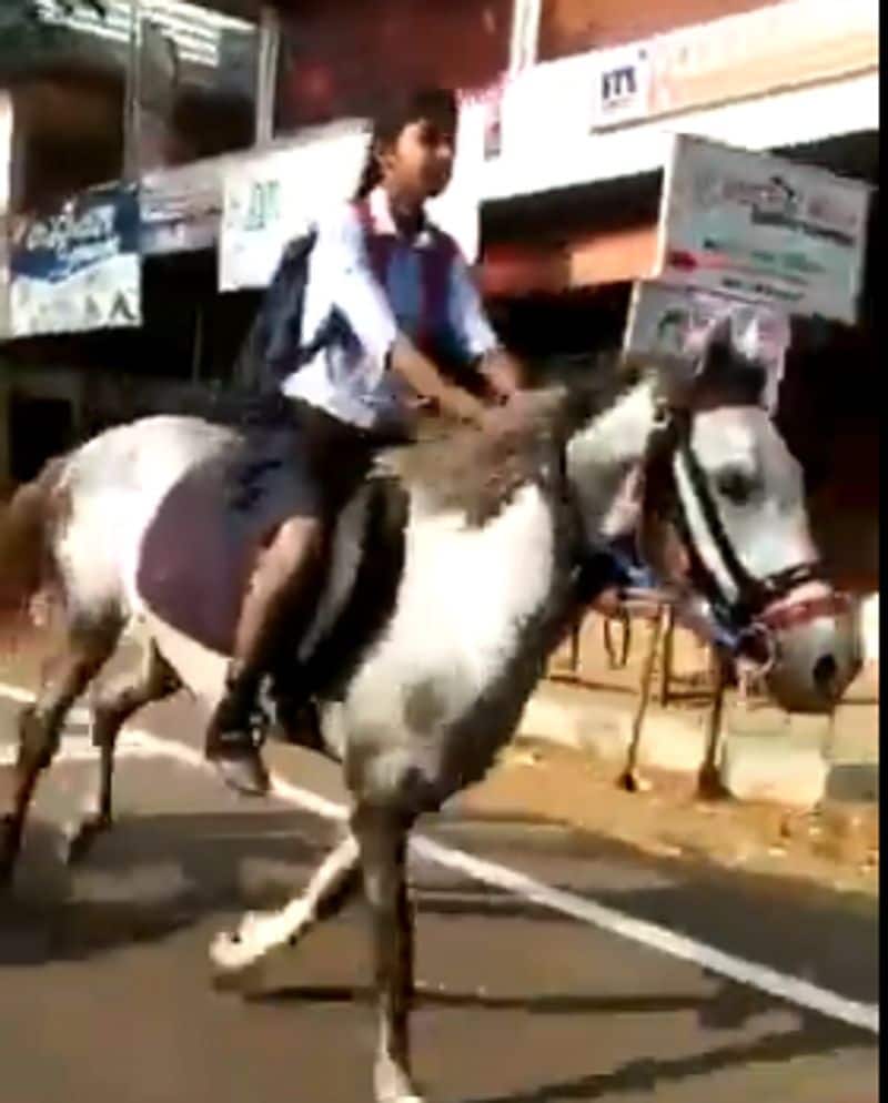 10th standard girl student riding the horse towards exam hall  in kerala