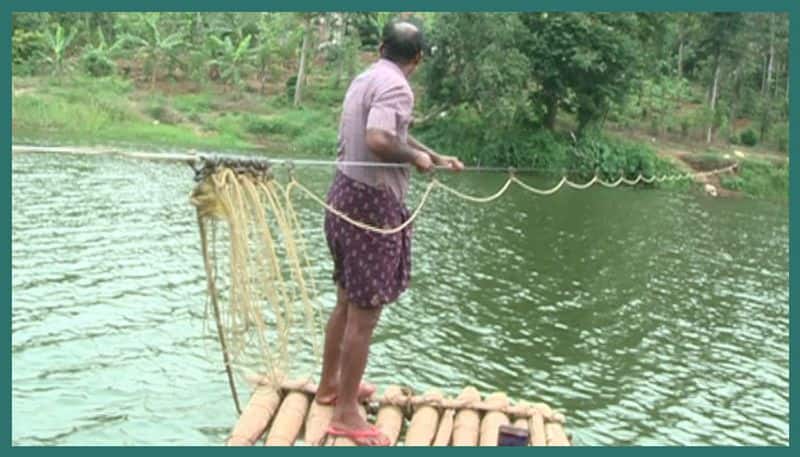 bridge destroyed in flood idukki village alady gets a risky journey to meet both ends