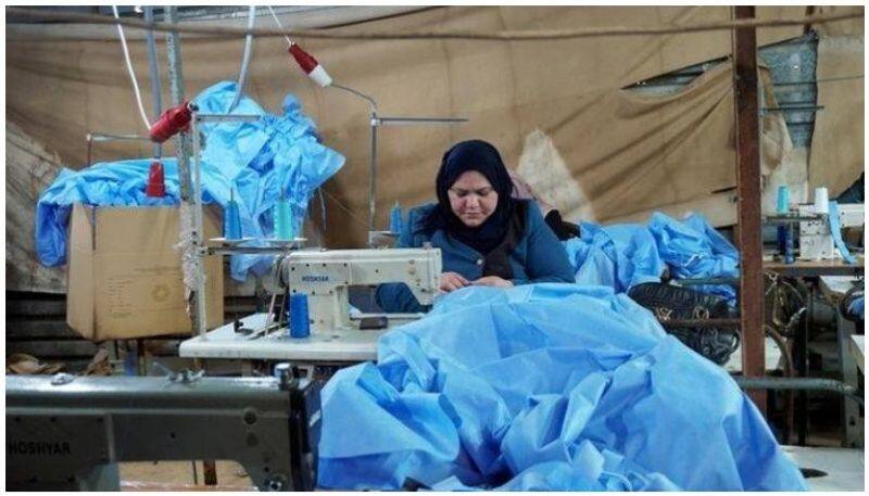 widows using sewing machine to restart life in mosul