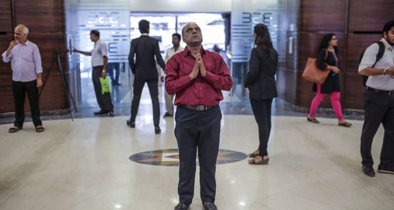Sensex claims record level ahead of rbi monetary policy decision on repo rate