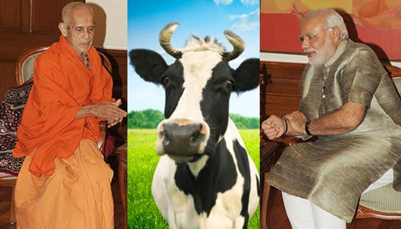 Karnataka Pejawar urges PM Modi bring cow protection law says those who kill cows are demons
