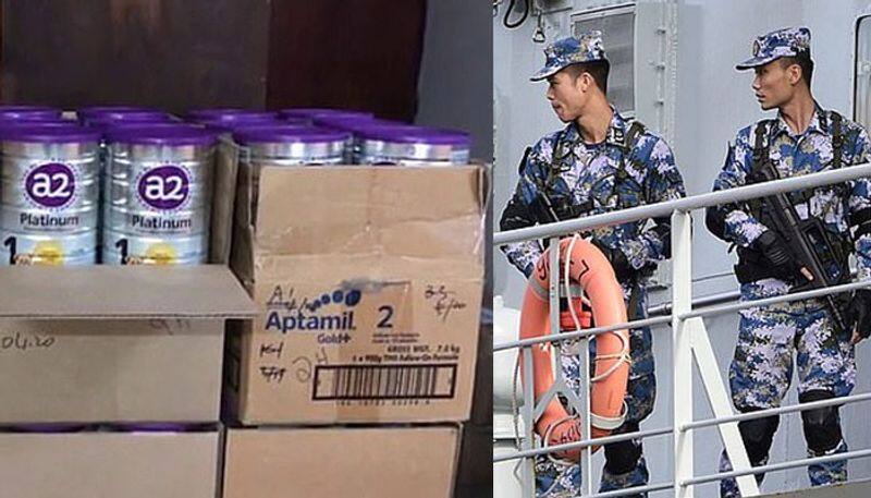chinese navymen spotted loading cartons of baby food from australia in to their warship in sidney