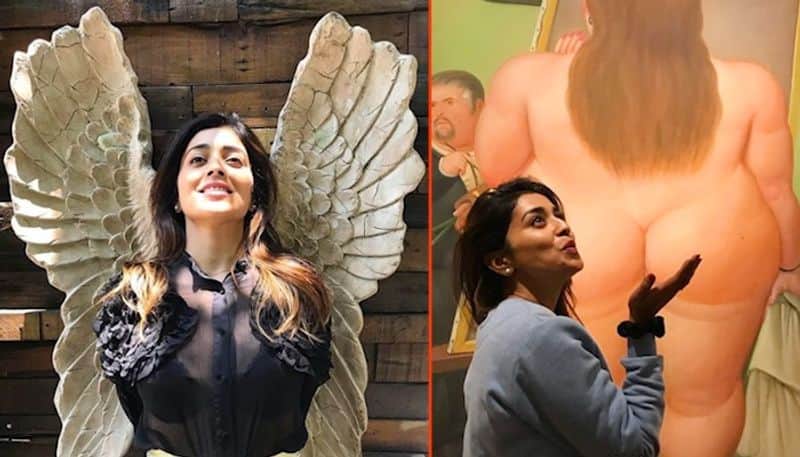 Shriya Saran gets trolled for posing in front of nude portrait (In Pics)