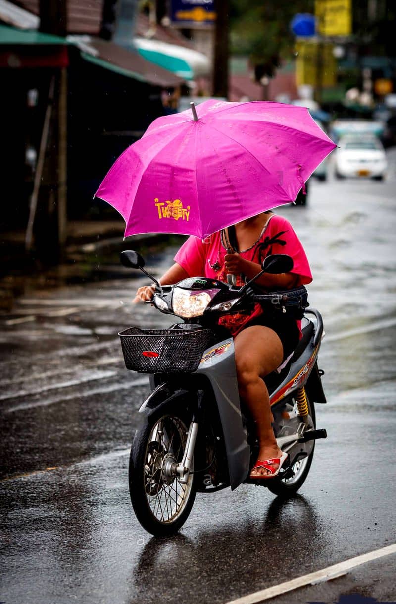 Do not open umbrellas when travel on bike