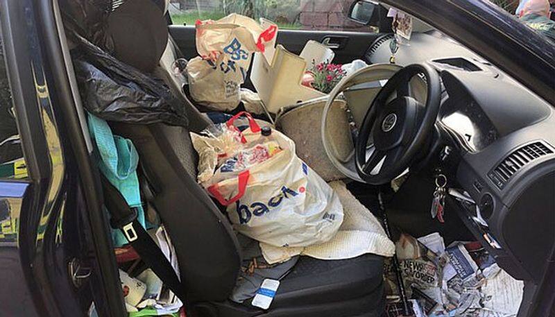 luxury vehicle crashes as owner fail to find handbrake under mounts of rubbish