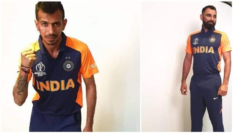 indian players in new orange jersey