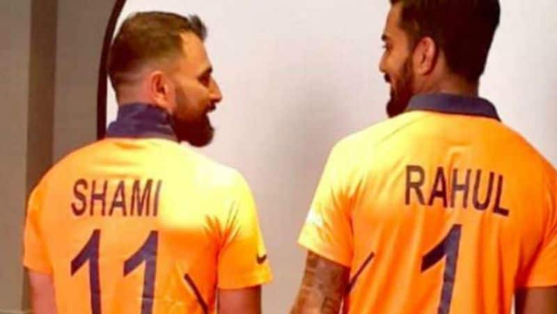 indian players in new orange jersey