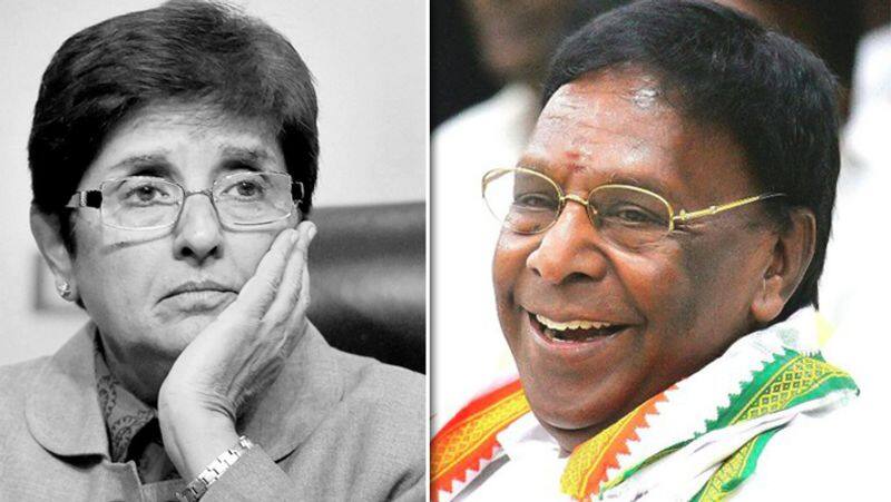 Narayanasamy and Kiranbedi fight each other on helmet issue