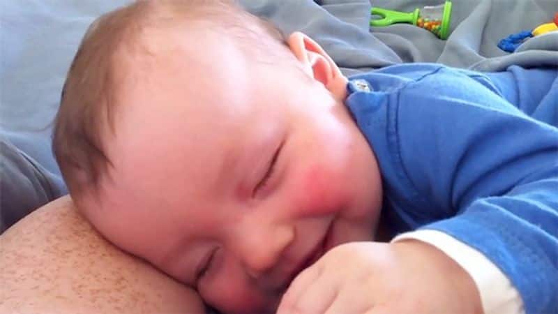 baby smile during sleep time