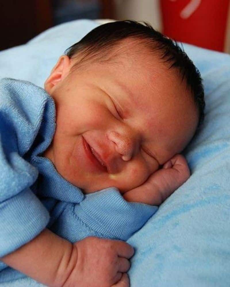 baby smile during sleep time