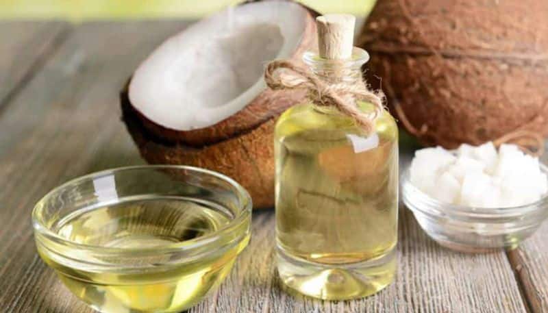 how to reduce our body weight  bu using coconut oil