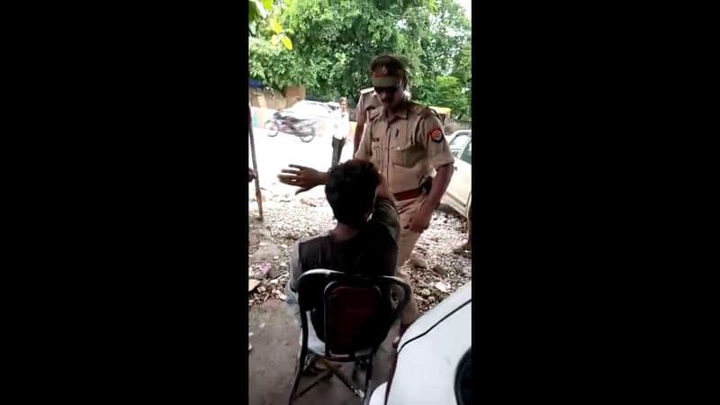 Policeman beaten a shopkeeper  in kanpur