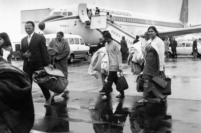 migration to india from uganda