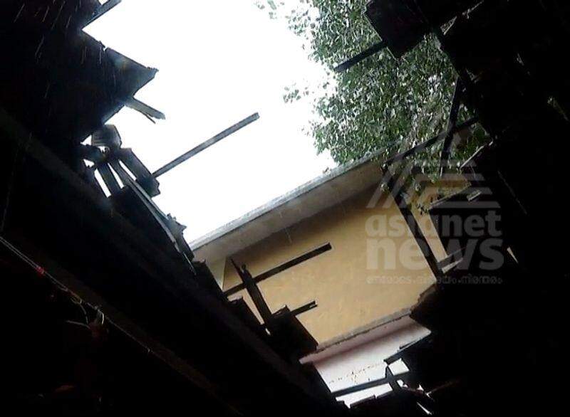 school building destroyed as iron pillars from private hotel falls on top of it