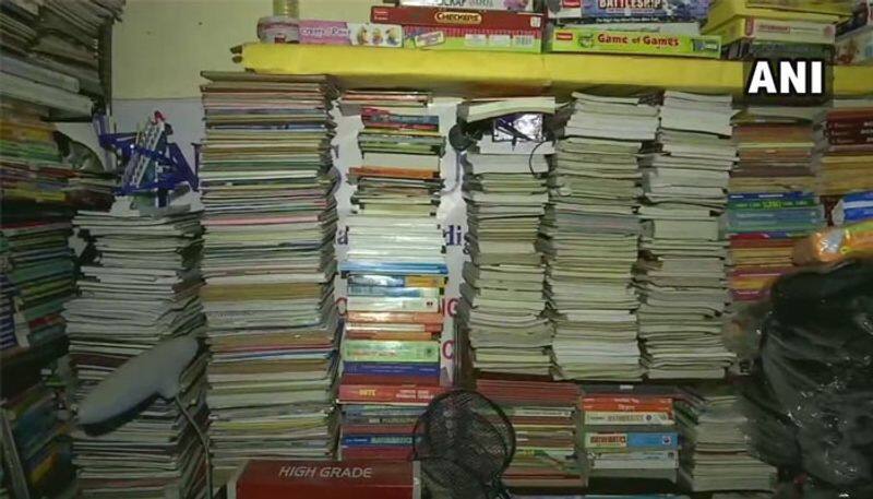 he collects book and distribute them to needy