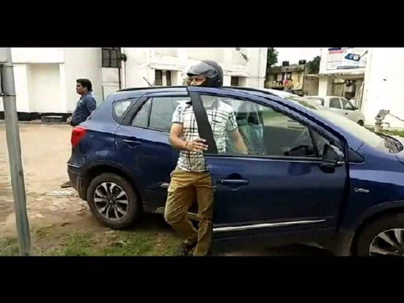 A car driver punished because not wearing helmet in aligarh uttar pradesh