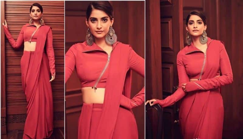 Sonam Kapoor gives a modern look to a classic saree