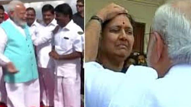 pm modi lefthand touch...AIADMK ministers shock