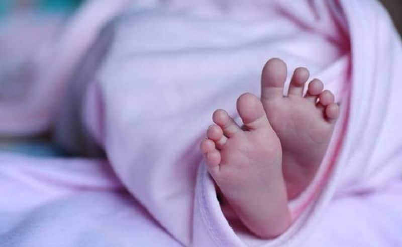 newly born baby's deadbody rescued from drain water