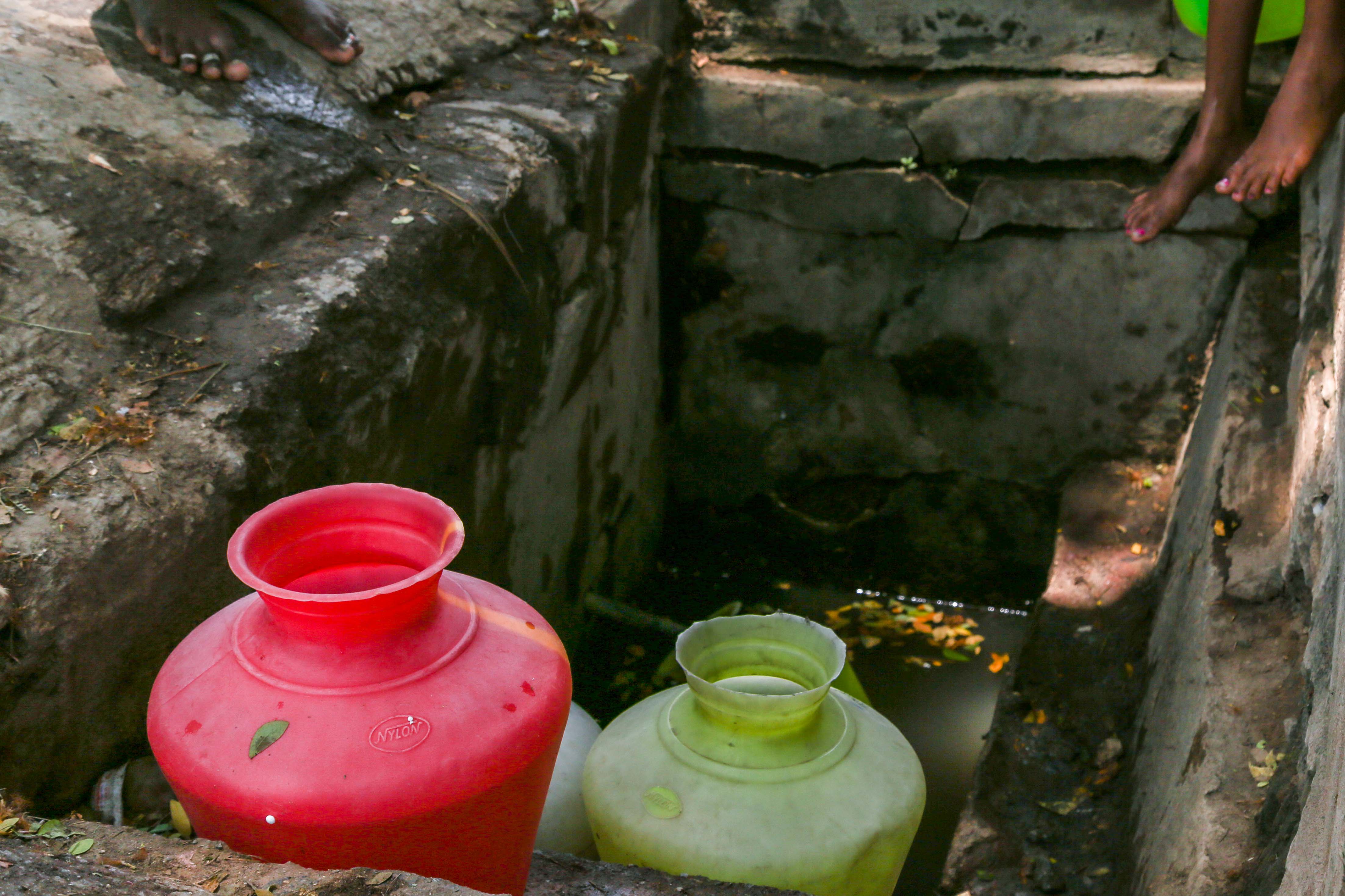 This dirty pit provides drinking water for Shanthinagar residents