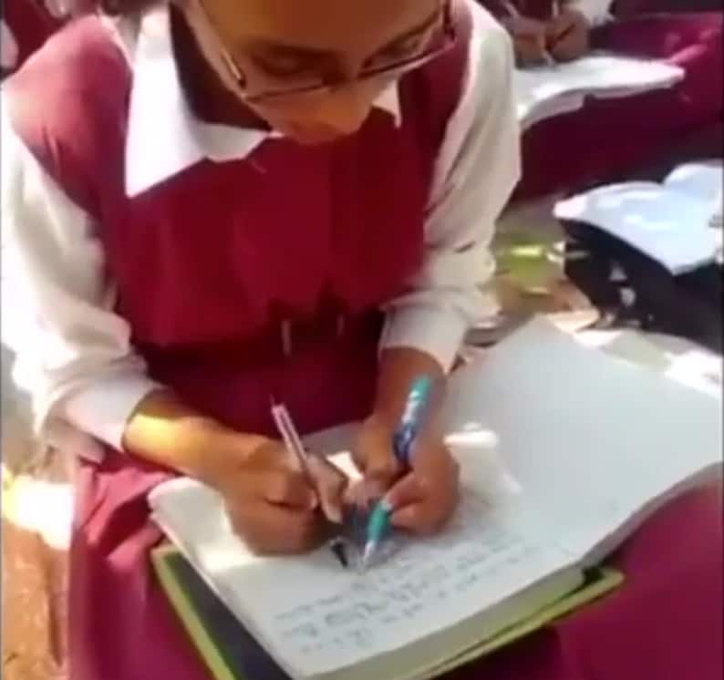Indian school makes its students write with both hands
