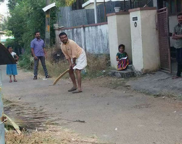 CPM MP Rajesh  seen  playing street smart cricket  in palakkad town