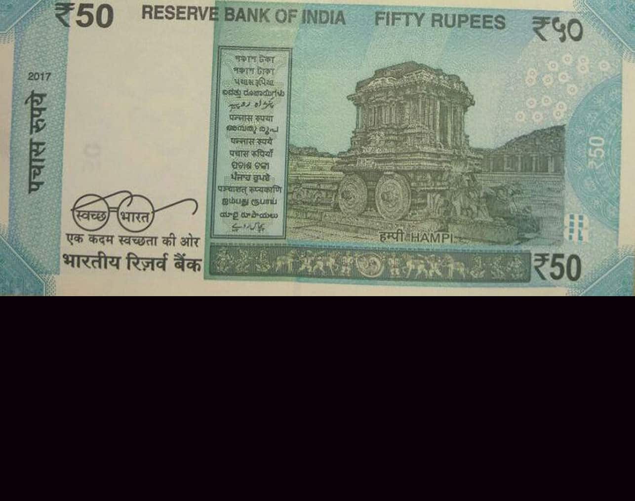 people wonder at the color of the new 50 note