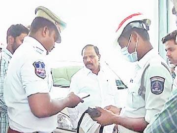 Hyderabad police collect fine from MLA for tinted car glass film