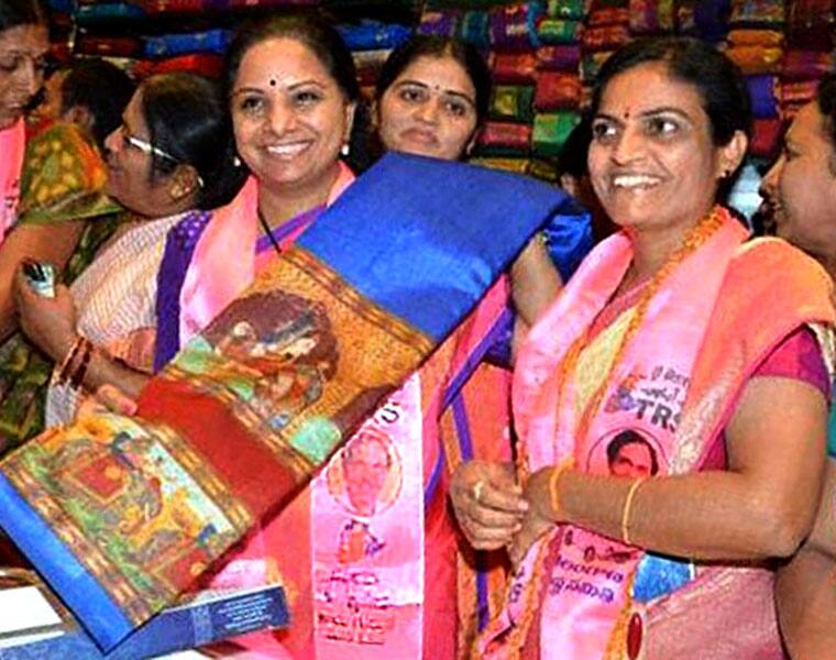 Bathukamma saree burning Opposition bashes KTR over poor quality sarees alleges Rs 150 cr scam