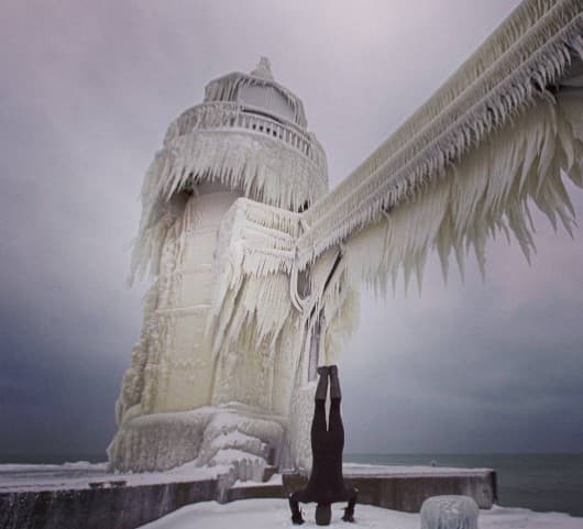 lighthouse gets a spectacular icy makeover
