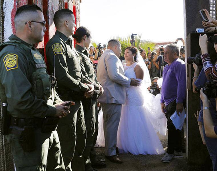 Border gate opens briefly for rare reunions and a wedding