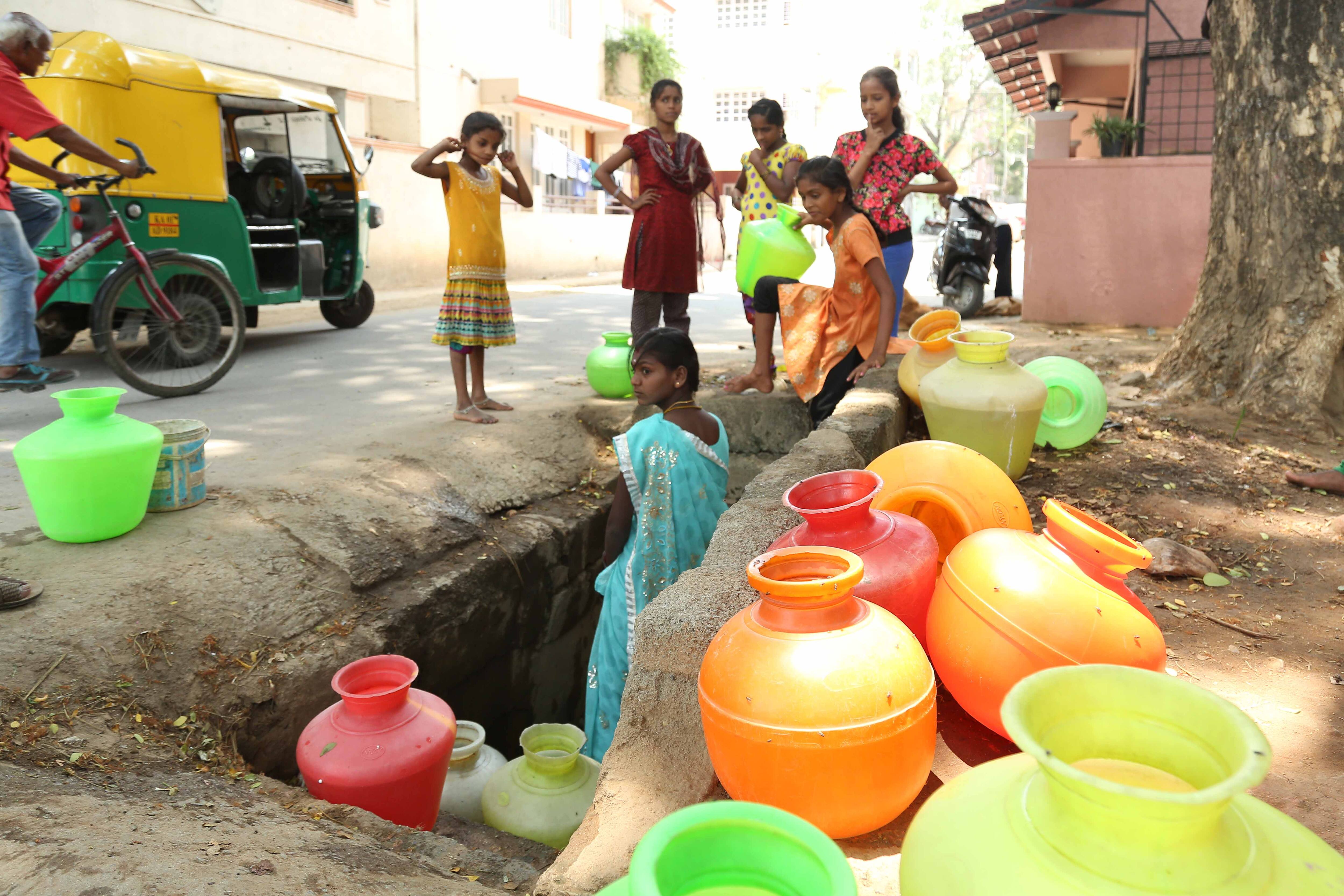 This dirty pit provides drinking water for Shanthinagar residents