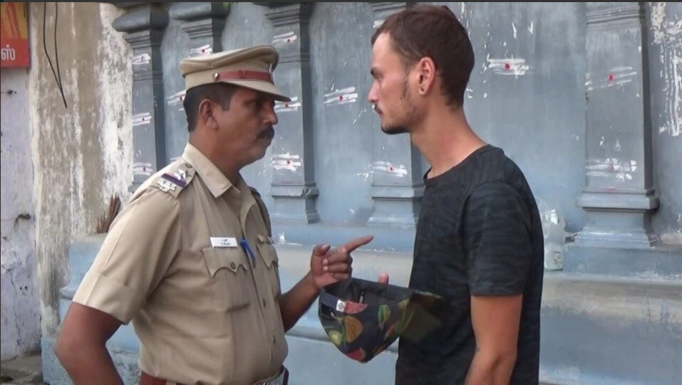 Russian tourist resorts to begging outside Tamil Nadu temple