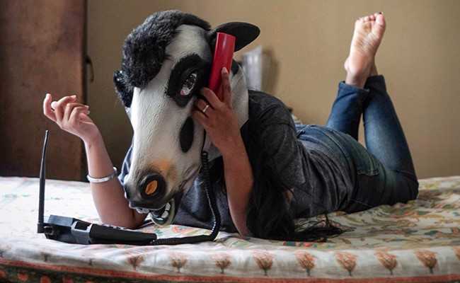 Women Don Cow Masks To Show They Are Less Safe Than Cattle