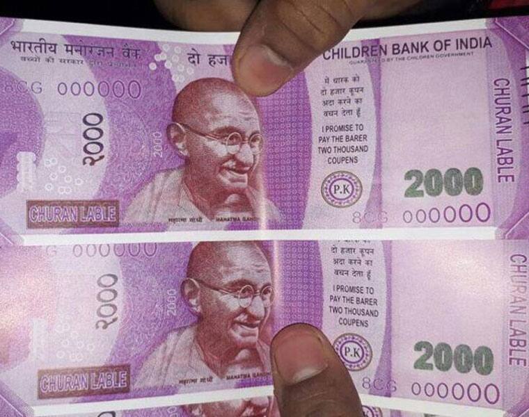 Fake Rs 2000 note in Axis Bank ATM Here is how to identify the real note