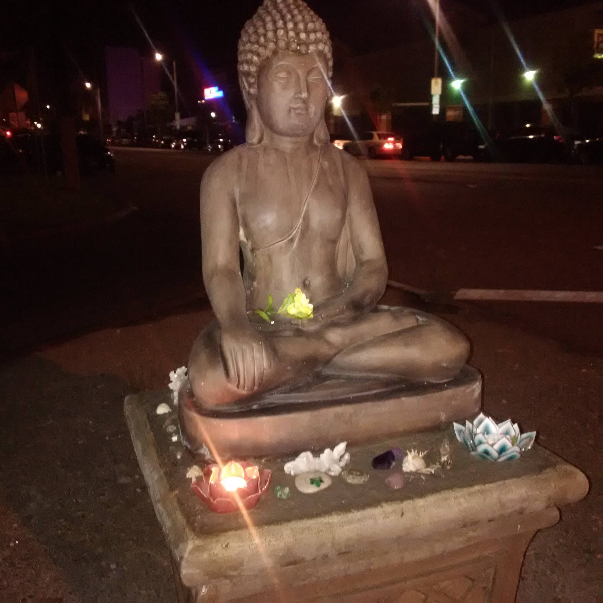 Buddha statue used to stop littering the area vandalised in Los Angeles street