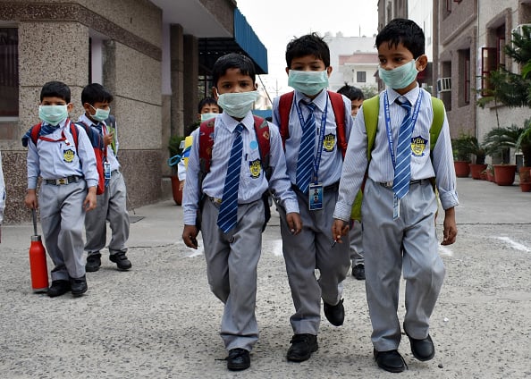 Delhis toxic air keeps a million students home forces expats to flee
