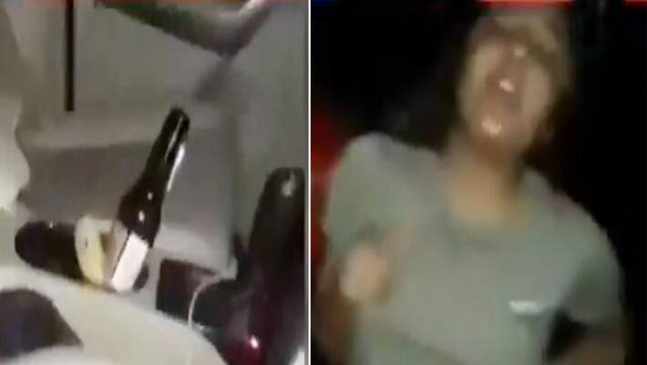 Delhi: Drunken Woman abuses and slaps traffic police Delhi: Drunken Woman abuses and slaps traffic police